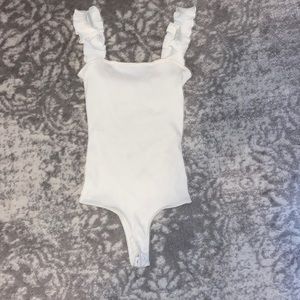 This is a one piece by Charlotte Avery